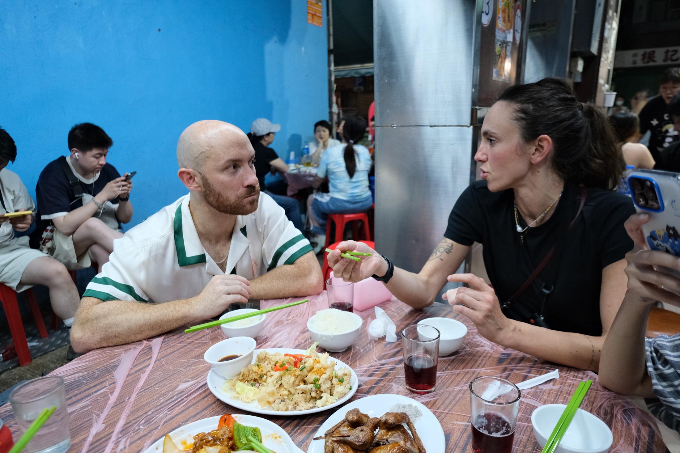 Guests sharing a meal on a food crawl